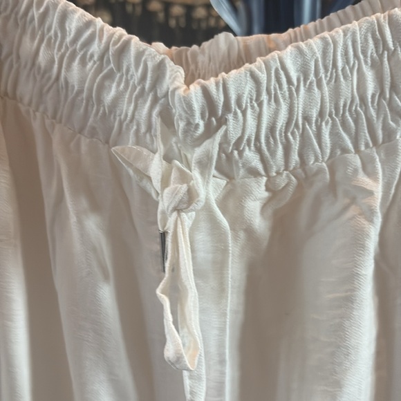 Classy and trendy Embroidered White top with a slip
On pants set - Picture 10 of 10